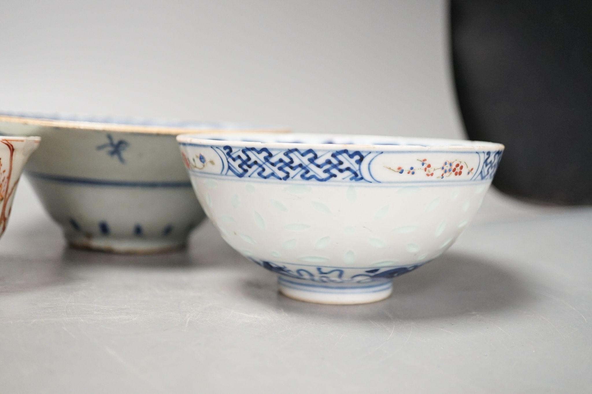 A Chinese blue glazed meiping, 20cm, and three Chinese porcelain bowls